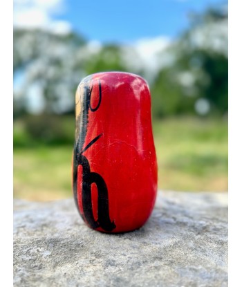 Kokeshi Daruma Rouge Calligraphié une grave pollution 